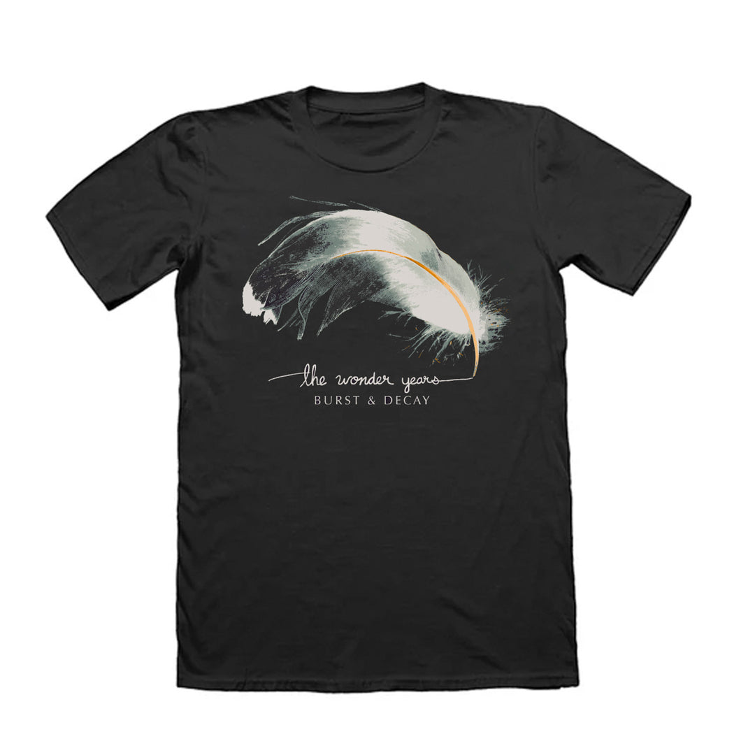 Printed on a Comfort Colors black t-shirt from The Wonder Years, this shirt displays a large light feather graphic above handwritten the wonder years and small caps BURST & DECAY.