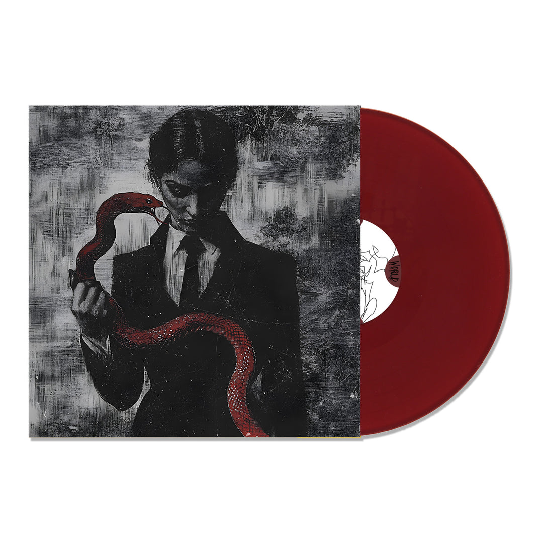 A limited edition maroon TX2 ‘Cruel World’ Oxblood LP partially slides from its cover, which displays dark art of a suited figure holding a red snake. The bold TX2 vinyl stands out against the textured black and gray backdrop.