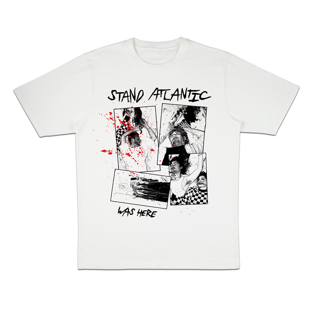 Stand Atlantic’s white ASCOLOUR tee features exclusive black-and-white comic-style illustrations with red splatters, “STAND ATLANTIC” at the top, and “WAS HERE” handwritten at the bottom.