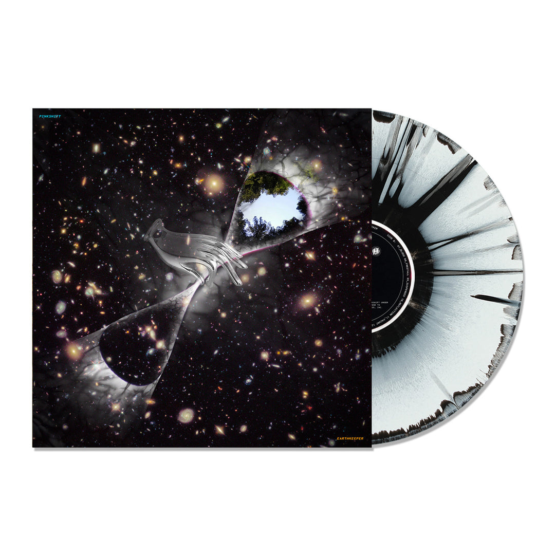 Limited Edition Pinkshift Earthkeeper LP vinyl with black and white splatter, partially in an album cover featuring a cosmic, star-filled background, abstract shapes, and a cutout showing blue sky and green trees.