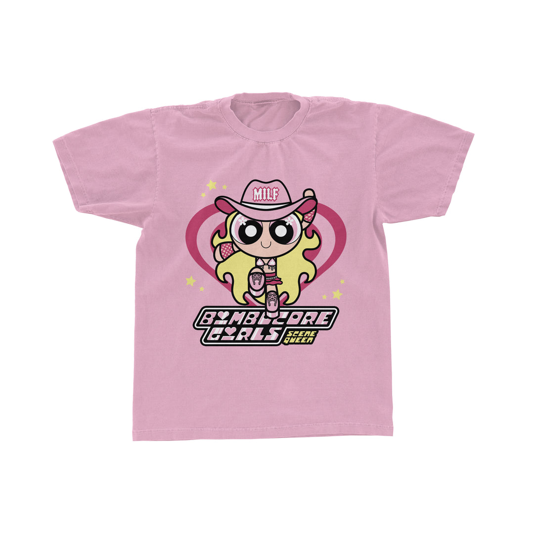 A printed pink Comfort Colors t-shirt by Scene Queen features a Powerpuff Girls-inspired cartoon wearing a MILF hat, boots, and holding a drink. Bombydore Girls Sefe Queen text appears below, with hearts and stars in the background.