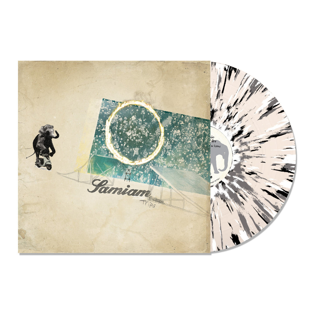 A limited edition splatter LP from Samiam partially slides out of its sleeve, which features an illustration of an elephant on a skateboard and abstract shapes, with "Samiam" and "Trips" written on it.