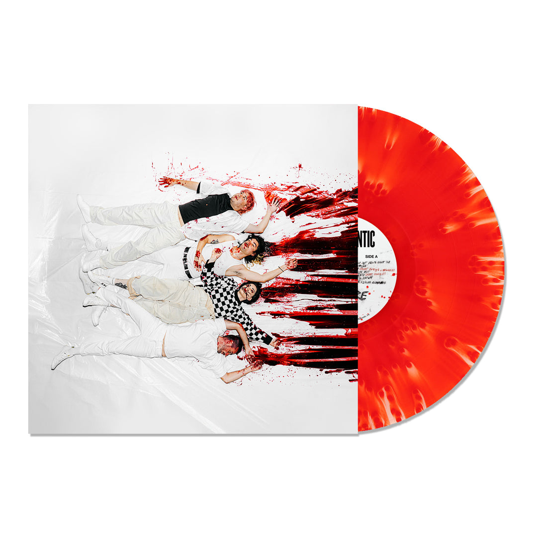 Five people dressed in white lie on a red-splattered surface, recreating the Stand Atlantic album cover next to a red and white marbled vinyl record partially pulled from its sleeve.