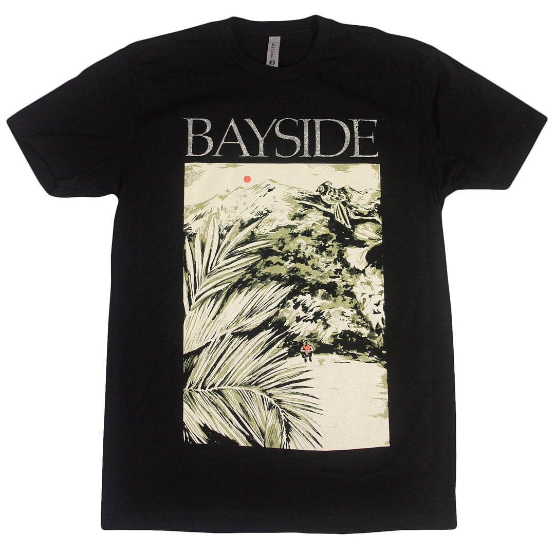Bayside black T-shirt with bold white BAYSIDE lettering above a landscape of palm leaves, trees, a red sun, and a distant figure. Made from ultra-comfortable Next Level Apparel.
