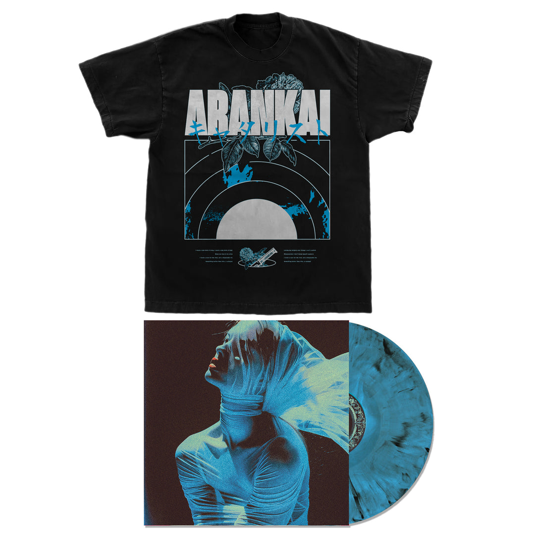 Black Comfort Colors t-shirt with ARAHKAI text and an eye-catching blue graphic design, next to a striking blue and black marbled limited edition vinyl record and its cover, featuring a person wrapped in white cloth against a dark background. Tracklisting included on the back of the cover for added detail.