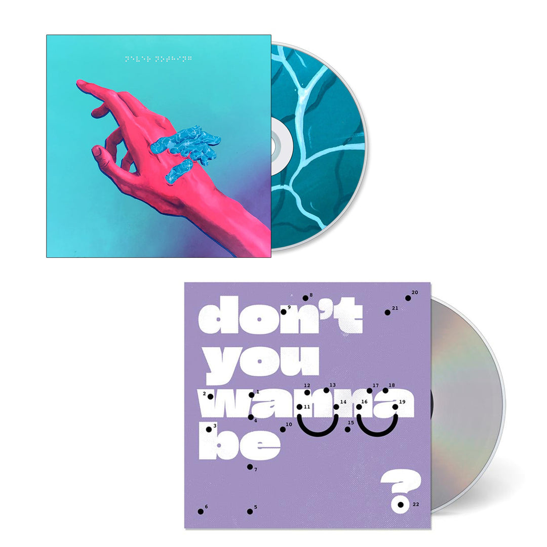 Two Super Whatevr CD albums: the top, likely Never Nothing, shows a pink hand with blue objects on teal; the bottom is don't you wanna be glad, featuring a purple cover with bold white text, "dont you want to be?.