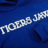 A royal blue Tigers Jaw Relax hoodie with large white TIGERS JAW felt applique across the chest, offering a unique, limited edition style.