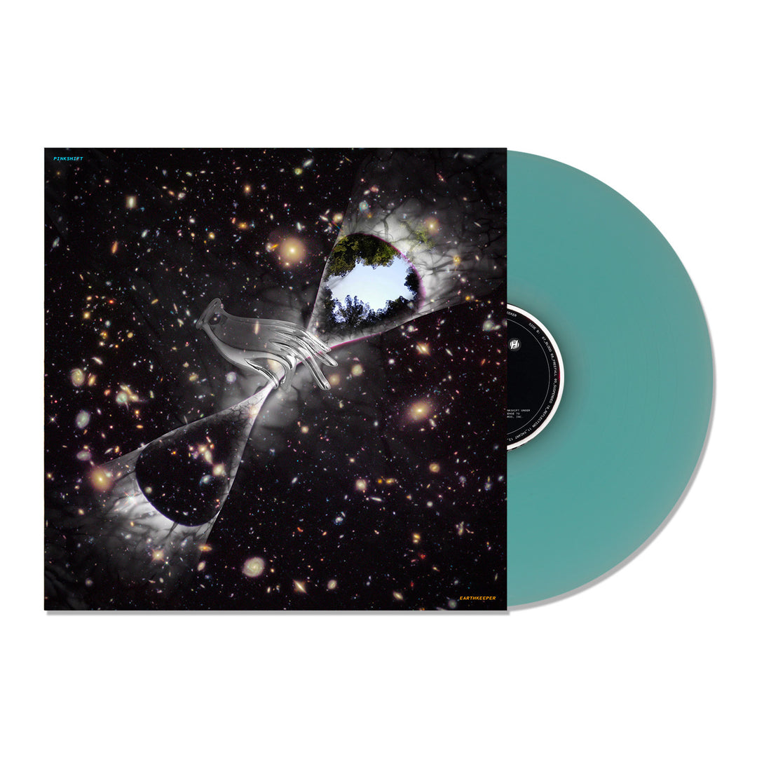 A teal Ice Blue LP peeks from a cosmic-themed cover with galaxies, an infinity symbol, and blue-sky trees—Pinkshift Earthkeeper by Pinkshift, limited to 1,000 copies worldwide.