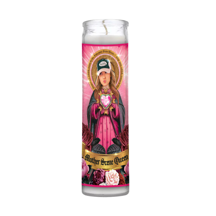 A limited edition Scene Queen prayer candle features an illustrated woman in pink and black with a trucker hat, holding a glowing heart amid roses. A banner reads Mother Scene Queen on a white background.
