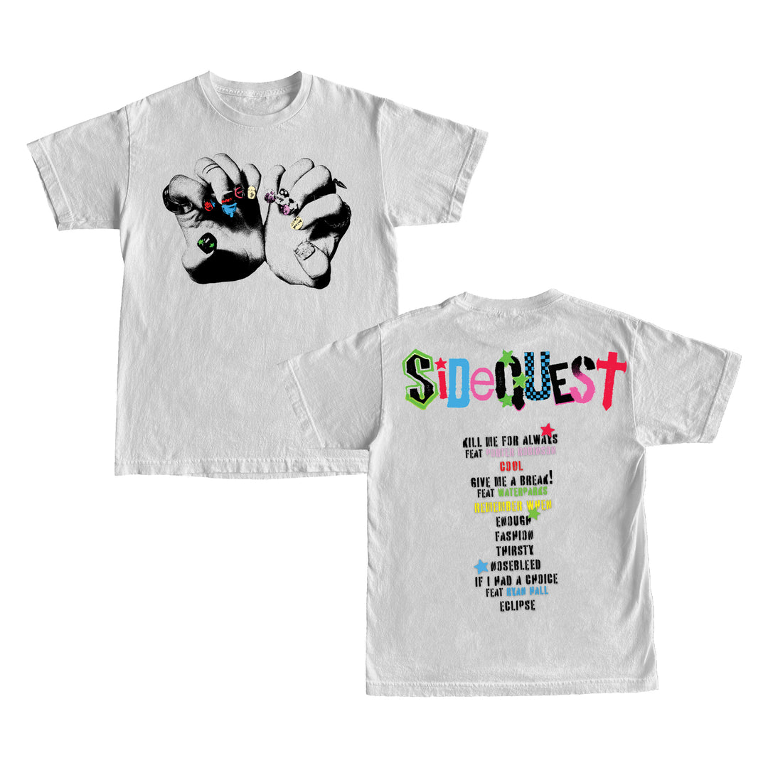 White printed t-shirt by Michael Clifford featuring a hand with rings graphic on the front. The back displays “SideQuest” in colorful letters and assorted phrases. Made from soft Comfort Colors fabric for maximum comfort.