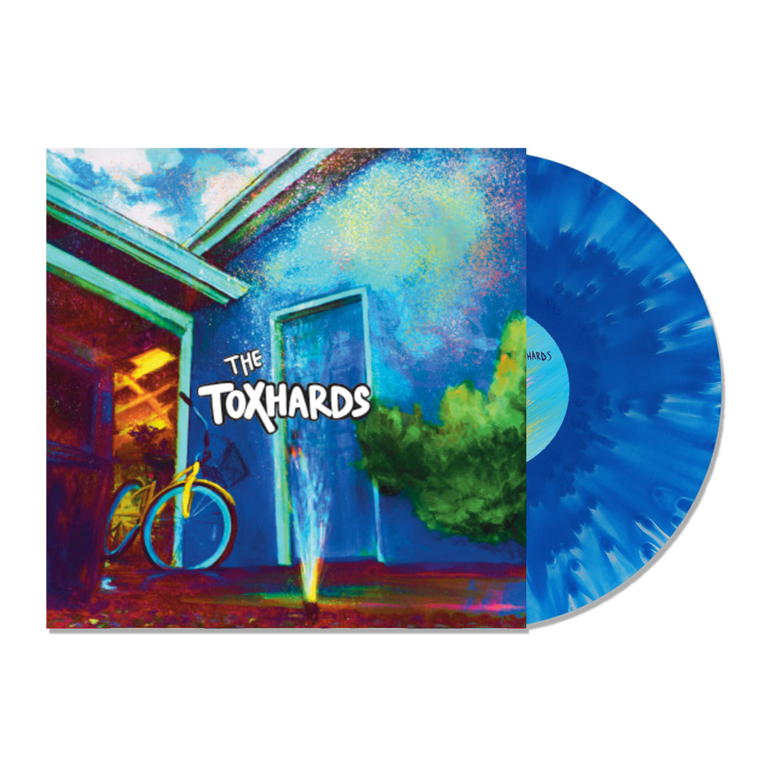 A vibrant album cover features a blue house with a green bush, a yellow and blue bike, and The Toxhards on the door. Next to it is The Toxhards Limited Edition Cloudy Blue Vinyl LP, partially visible.