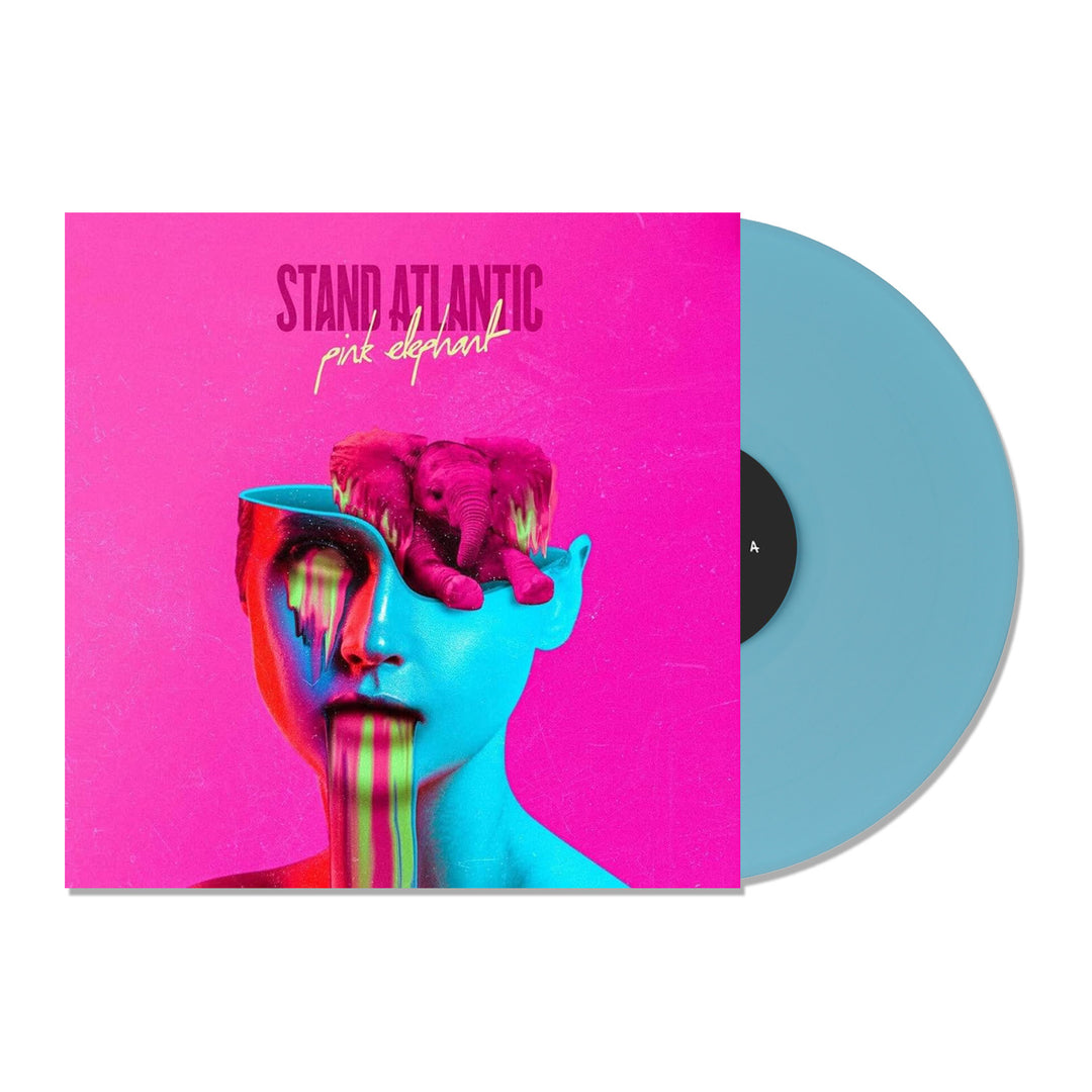 The Stand Atlantic Limited Edition LP, Pink Elephant, showcases vibrant artwork of a woman’s head with a pink elephant and colorful paint on a blue vinyl record.