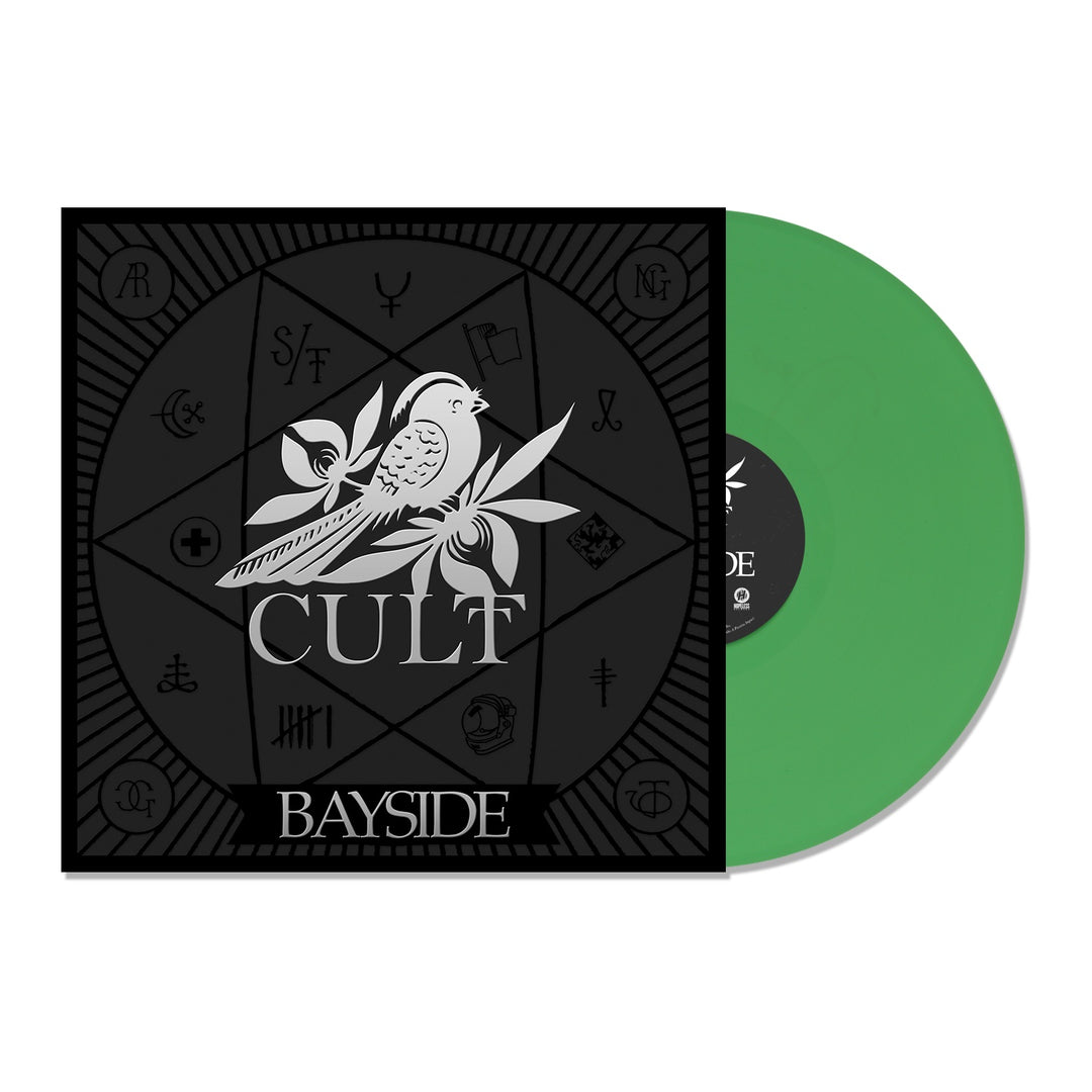 A green Doublemint vinyl record partially inserted in a black album cover with a white bird, foliage, “CULT,” symbols in a circle, and tracklisting along the bottom. The brand name Bayside appears on the cover.