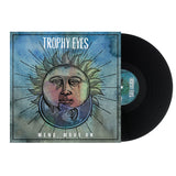 A black vinyl record partially out of its sleeve reveals the Mend Move On album by Trophy Eyes: an illustrated sun and moon face on a blue watercolor background with rays and the band name above, plus the tracklist on the back.