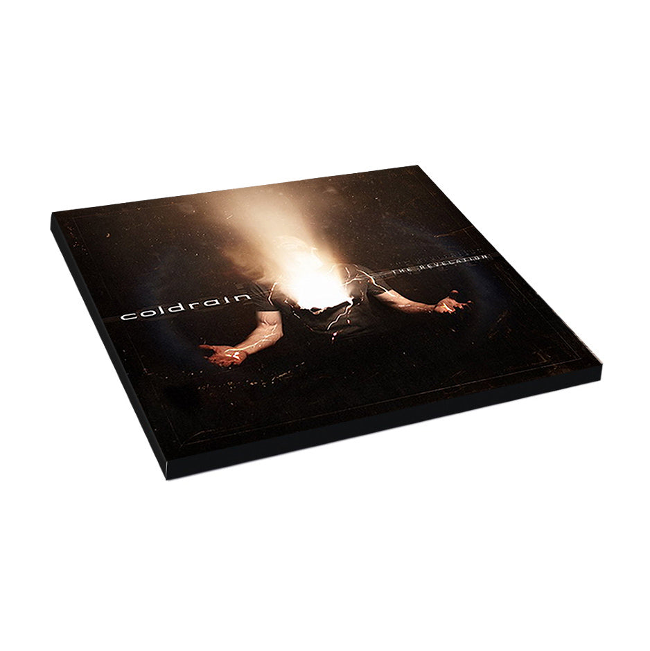A U.S. album cover from Coldrain features a dark background, a person with light exploding from their head, Japanese text, and hands holding something red—reflecting the bands heavy yet melodic style.