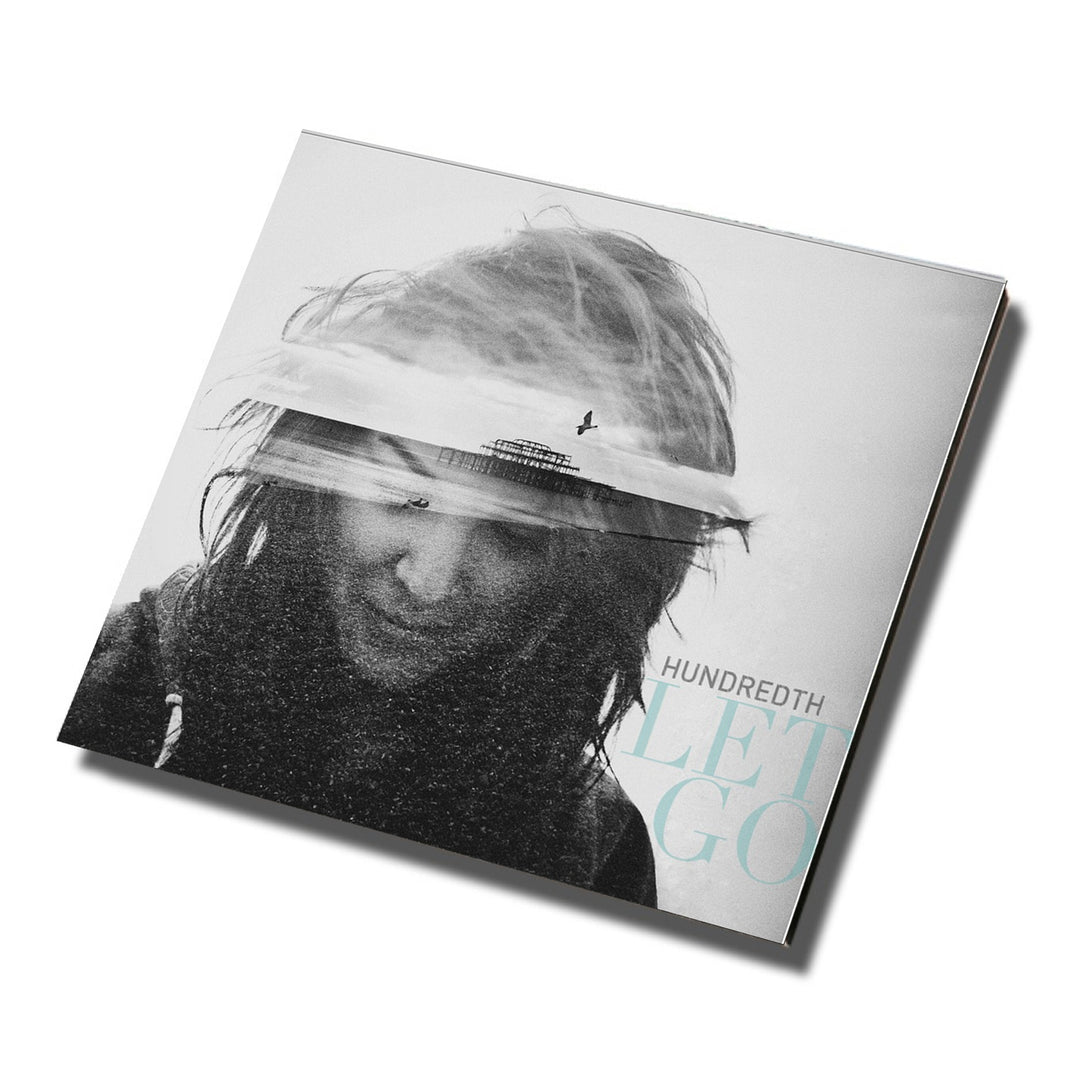 A vinyl record cover by Hundredth with a grayscale photo of a person’s windblown hair, overlaid with a pier and lone figure. The text “Hundredth Let Go” appears in light blue/gray—evoking the vibe of Cody Bonnette’s Weathered Town.