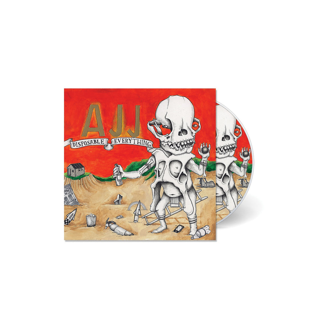 AJJ Disposable Everything CD with case, featuring artwork of a skeletal figure with multiple heads and limbs on a trash-strewn landscape under a red sky, album title Disposable Everything on a banner.