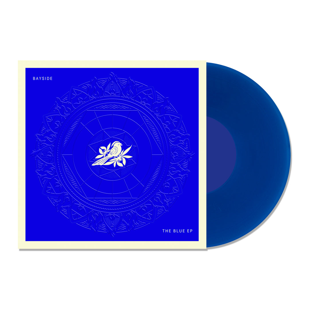 Vinyl album cover for Bayside "The Blue EP" on a white background. Cover is Blue with a Mandala. White bird on a flower centered. White Text in the corners "Bayside" & "The Blue EP". Vinyl is Transparent Blue.