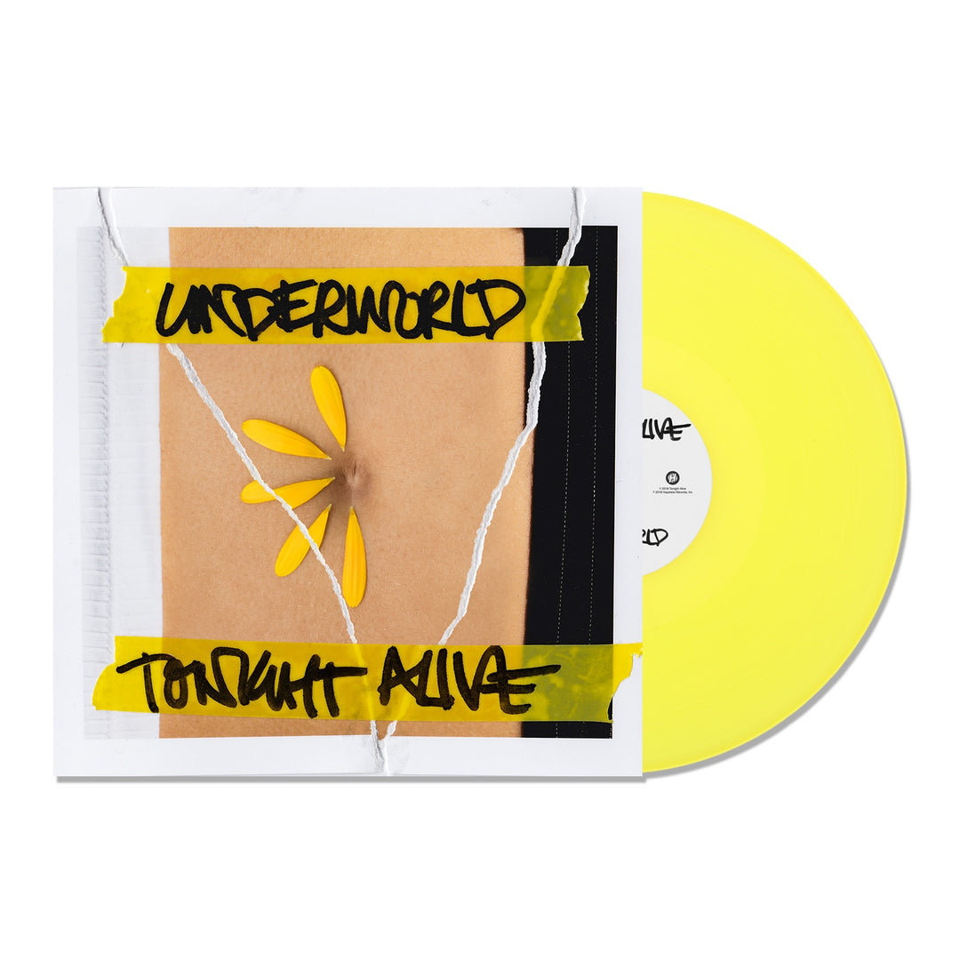 A yellow vinyl record partially in its sleeve. The Tonight Alive album cover features yellow tape with black text reading “Tonight Alive,” and a daisy with missing petals on a brown background.