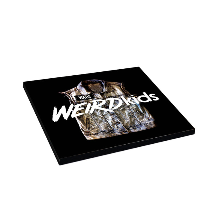An album cover for We Are The In Crowd featuring a sleeveless denim jacket, the word WAIT above, and WEIRDKids in bold white letters on black, celebrating their iconic Weird Kids CD tracklisting style.