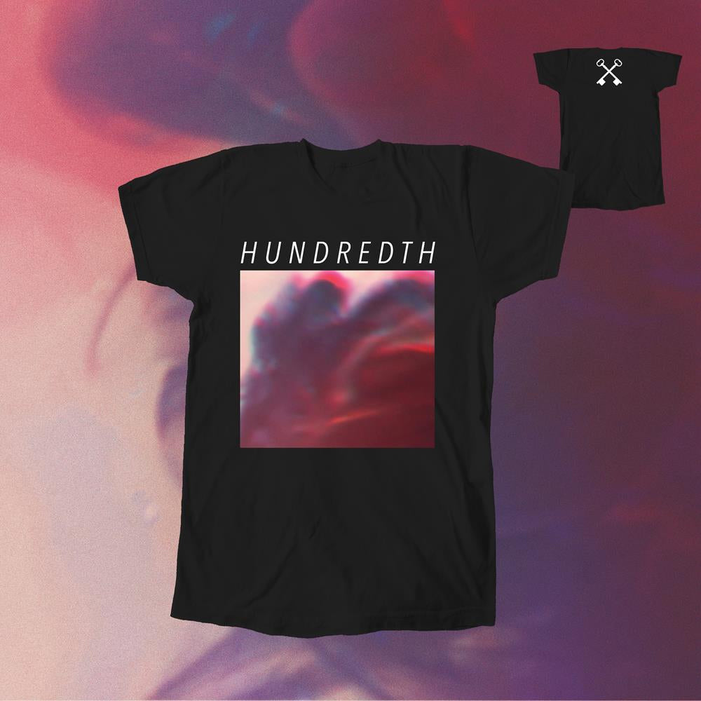 Hundredth black t-shirt with the band’s name above a square, abstract red and purple blurred image. Back features a small white crossed keys graphic near the collar. Includes free album download. Displayed on matching abstract background.