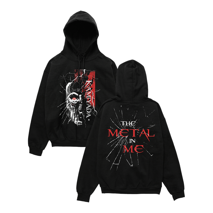 Black pullover on a white background. Front of the tee has a robot face with a red eye with text Kamiyada+. Back print says THE METAL IN ME with glass shatter effect.