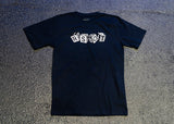 A black Trash Boat T-shirt laid flat on a textured surface, featuring RSBOT in white 3D-style block letters—a perfect piece of band merch for fans.