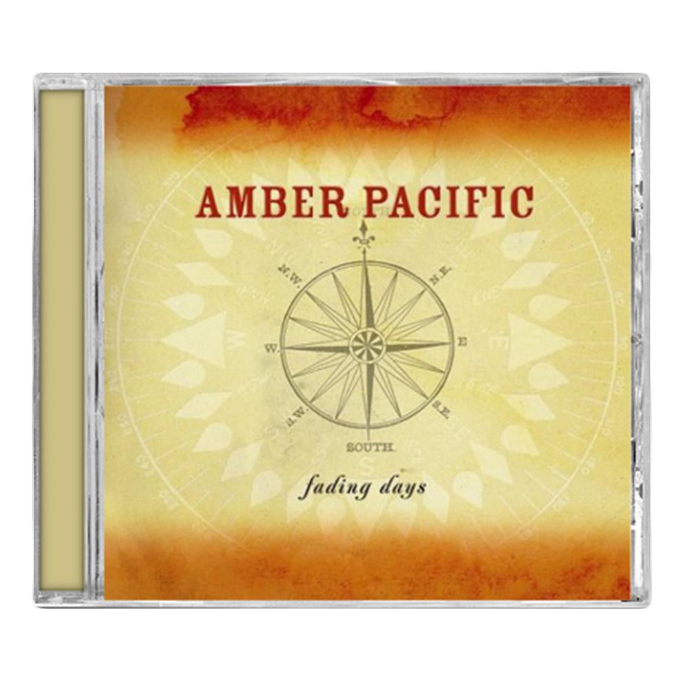 Amber Pacific CD cover for the Fading Days album, with a faded compass on a yellow-orange background, band name in red, and album title in cursive—ideal for fans to enjoy the complete tracklist.