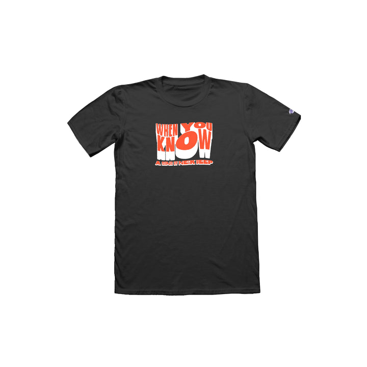 The Neck Deep When You Know tee, made from 100% Cotton Gildan Hammer, showcases a bold orange and white WHEN YOU KNOW YOU KNOW graphic in playful font, with subtle small text underneath.