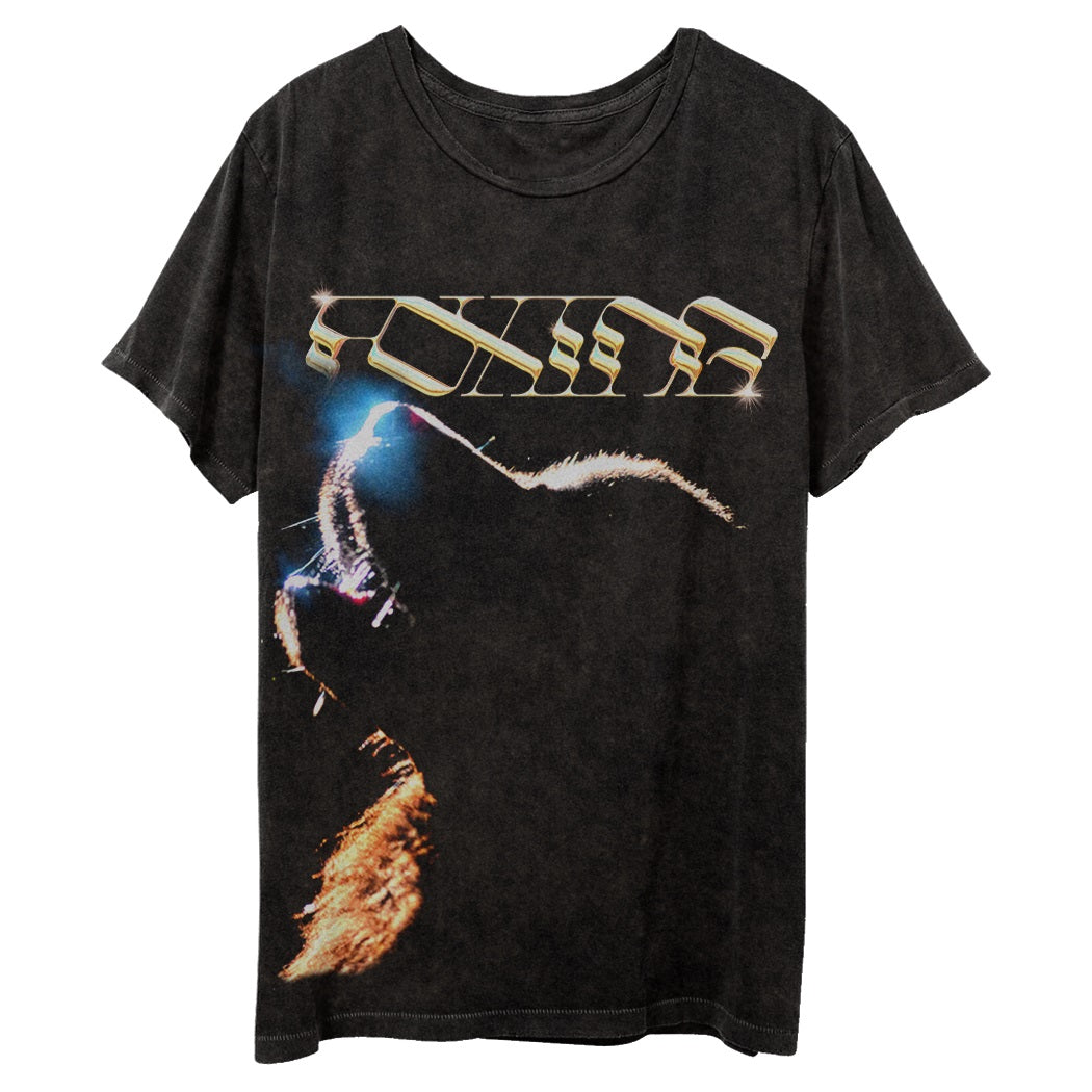 Black tee on a white background. Foxing text across the chest above a faded image of a dog howling. 