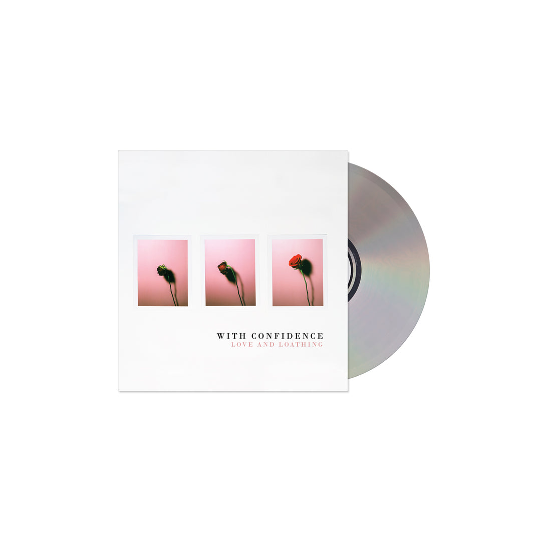 A With Confidence CD for the album Love and Loathing, featuring tracks like Icarus and Moving Boxes. The cover shows three photos of a red rose on pink, arranged in a row on a white square, with the CD partially shown to the right.
