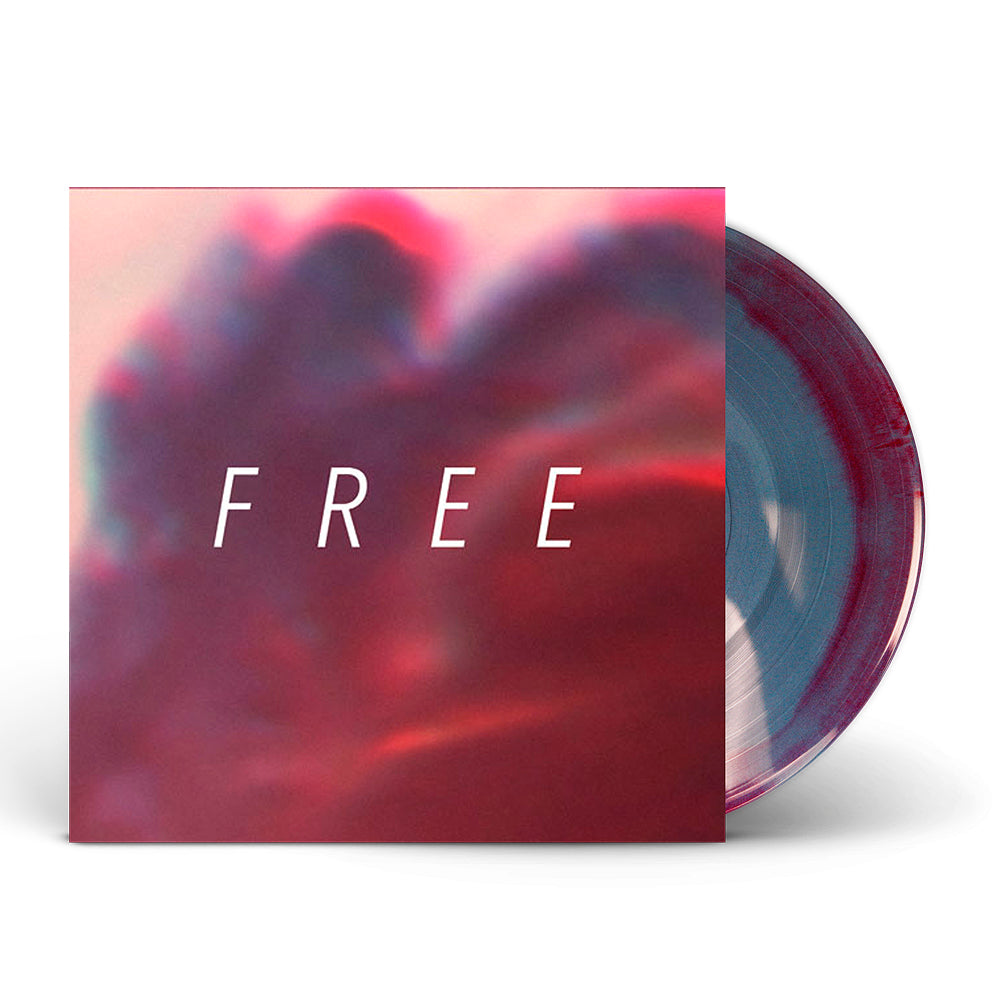 A red and blue marbled vinyl by Hundredth peeks out from a cover with a soft abstract pink and purple design, FREE in bold white letters on the front, and a detailed track list on the back.